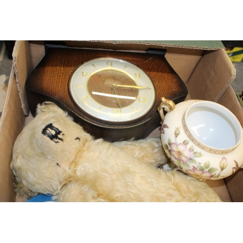 58 - A mixed collection of items to include a Merrythought teddy bear, Smiths mantle clock and other simi... 