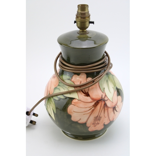 31 - Moorcroft 'Hibiscus' pattern lamp base, 32cm tall.