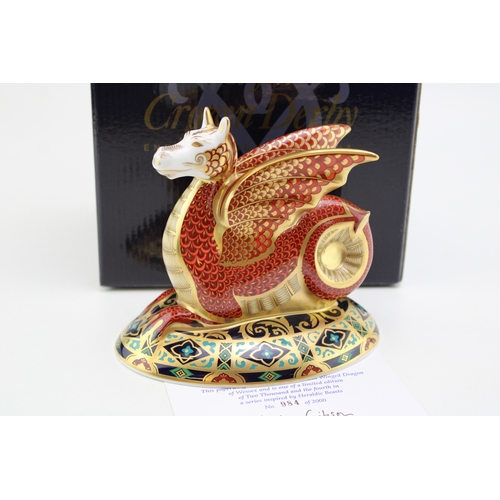 Royal Crown Derby paperweight, The Wessex Wyvern, 13cm high, based on the fabled winged dragon of Wessex and the fourth in the series inspired by Heraldic Beasts, facsimile signed on the base by designer Louise Adams, this is number 984 of a limited edition of 2,000, gold stopper, red printed marks, boxed with certificate.