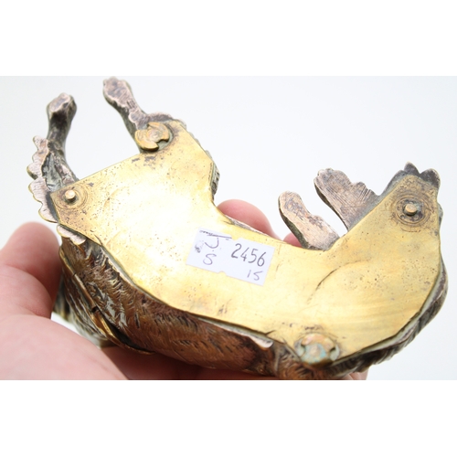 11 - A late c19th Victorian brass inkwell in the form of a spaniel dog with glass eyes with hinged head