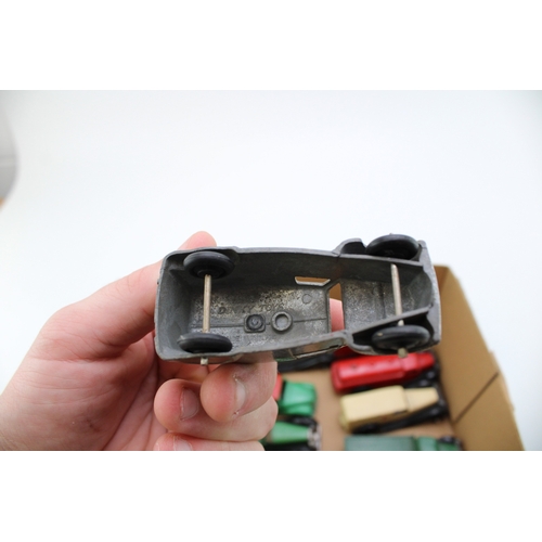 61 - A collection of vintage Dinky Toys to include Dinky 470 Austin 