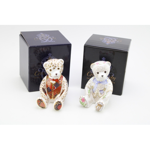A Royal Crown Derby paperweight, Christening Teddy Bear, 12cm high, one of a limited edition of 500 commissioned by Goviers of Sidmouth to celebrate the christening of HRH Prince George of Cambridge in 2013 and a Teddy Bear with red bow tie, 12cm high, one of an exclusive limited edition of 950, commissioned exclusively by Govier's of Sidmouth, both with gold stoppers and red printed marks to the base, boxed (2).