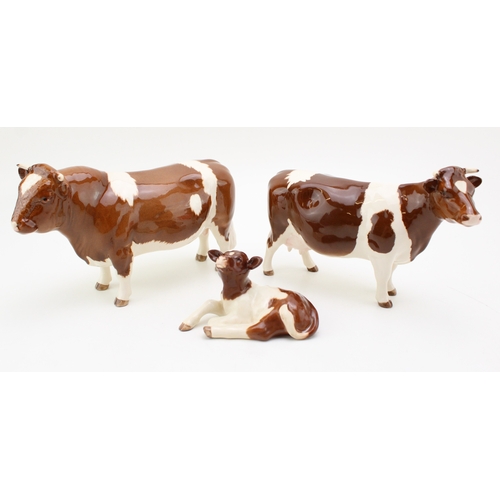 Beswick Red Friesian family comprising bull 1439B, cow 1362B and laying calf 2690, made for the Beswick Collectors Club in 1992 in a small limited edition (3).