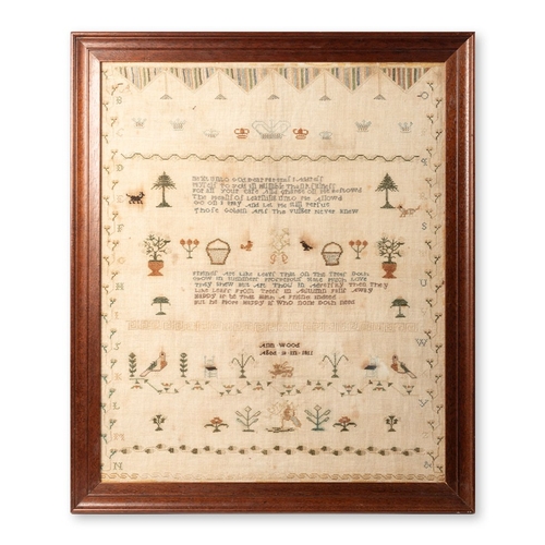 George III sampler by 'Ann Wood, Aged 10 in 1811' with verse to include 'friendf are like the leavf that on the treef doth grow in summer', 63.5cm x 52cm, excluding later frame.