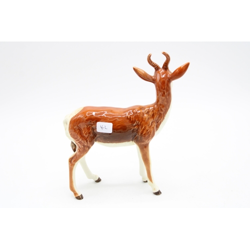 56 - Beswick Springbok 1048 (left antler repaired).