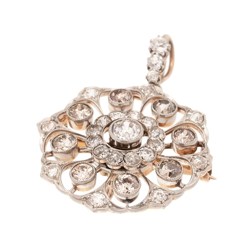 265 - An Art Nouveau diamond set metamorphic pendant brooch, with central diamond of approximately 4.5mm d... 