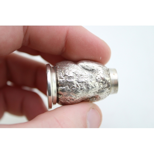 139 - An early 20th century novelty silver pepperette or pepper pot, in the form of a seated teddy bear, C... 