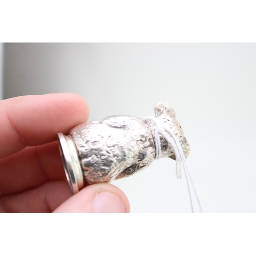 139 - An early 20th century novelty silver pepperette or pepper pot, in the form of a seated teddy bear, C... 