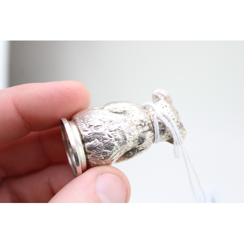 139 - An early 20th century novelty silver pepperette or pepper pot, in the form of a seated teddy bear, C... 