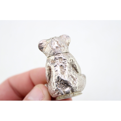 140 - An early 20th century novelty silver pepperette or pepper pot, in the form of a seated teddy bear, C... 