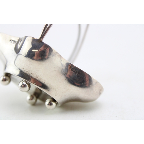 153 - A silver miniature basket, of quatrafoil form with handle over, raised on four ball feet, Adie & Lov... 