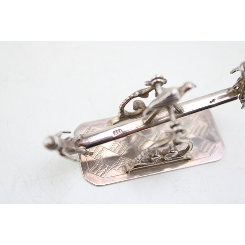 157 - A turn of the 20th century Dutch silver model of a see-saw, fully balanced and movable with a child ... 