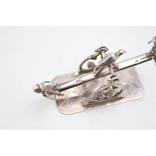 157 - A turn of the 20th century Dutch silver model of a see-saw, fully balanced and movable with a child ... 