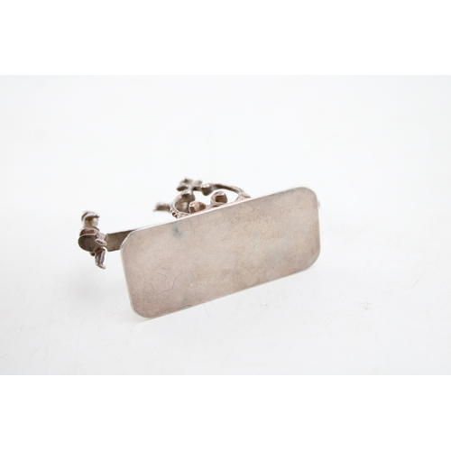 157 - A turn of the 20th century Dutch silver model of a see-saw, fully balanced and movable with a child ... 