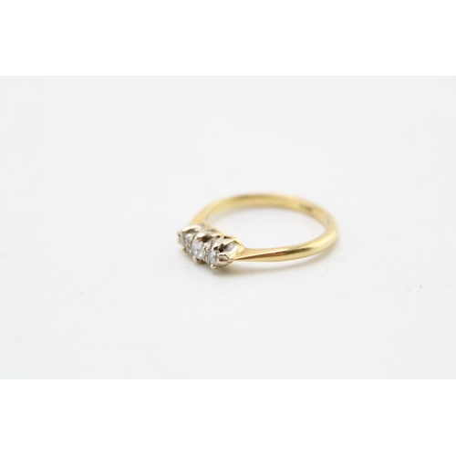 183 - An 18ct gold and diamond three stone ring, the old European cut diamonds of slightly graduated size,... 