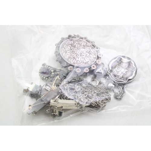 184 - A group of silver, jewellery comprising a necklace set with purple and white fluorite and marcasite,... 