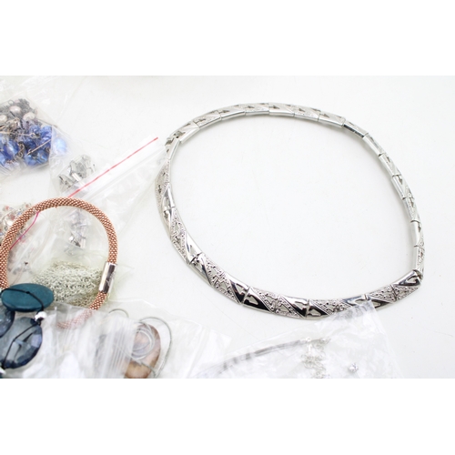 184 - A group of silver, jewellery comprising a necklace set with purple and white fluorite and marcasite,... 