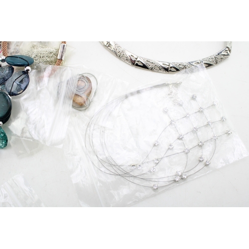 184 - A group of silver, jewellery comprising a necklace set with purple and white fluorite and marcasite,... 