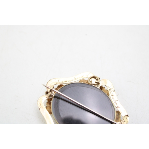 199 - A gold memorial brooch with plaited hair to central component, the rear  reading 'In Remembrance of ... 