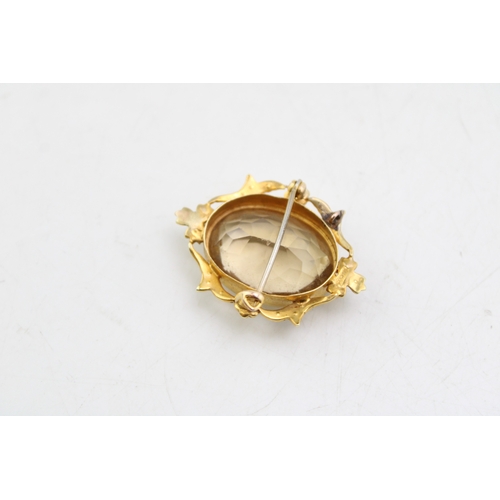 204 - 15ct gold brooch with central citrine stone, bordered by twenty seed pearls in floral settings, 24mm... 