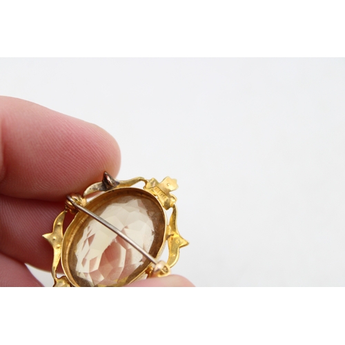204 - 15ct gold brooch with central citrine stone, bordered by twenty seed pearls in floral settings, 24mm... 