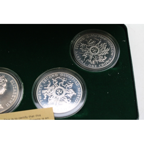 21 - Four sterling silver crowns, Olympics related, QEII 1980 115g appx, cased & COA, Isle of Man.