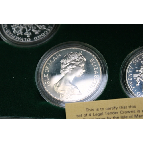 21 - Four sterling silver crowns, Olympics related, QEII 1980 115g appx, cased & COA, Isle of Man.