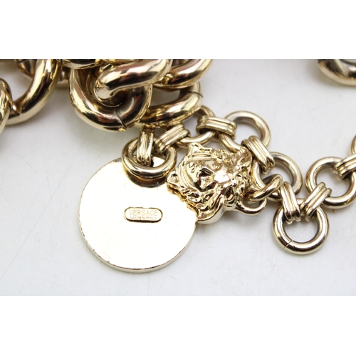 221 - A group of vintage designer costume jewellery comprising two Christian Dior necklaces, one of flat '... 