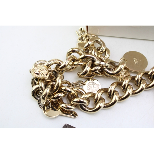 221 - A group of vintage designer costume jewellery comprising two Christian Dior necklaces, one of flat '... 