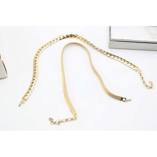221 - A group of vintage designer costume jewellery comprising two Christian Dior necklaces, one of flat '... 