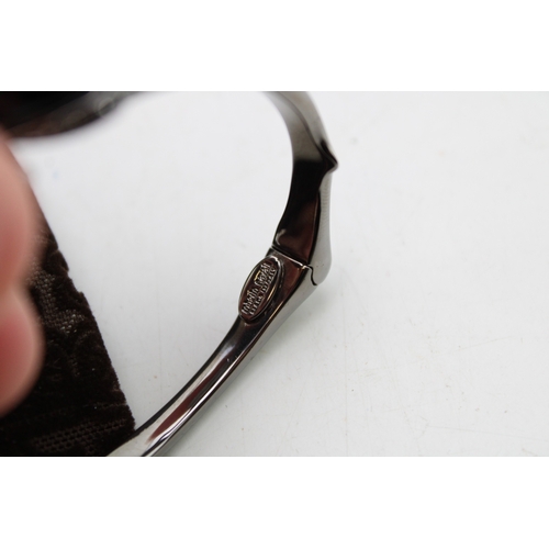 221 - A group of vintage designer costume jewellery comprising two Christian Dior necklaces, one of flat '... 