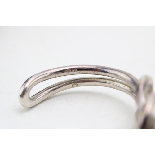 222 - Georg Jensen: a silver love or reef knot open cuff bangle of double strand form, marked with circula... 