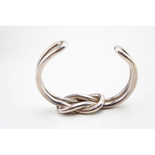 222 - Georg Jensen: a silver love or reef knot open cuff bangle of double strand form, marked with circula... 