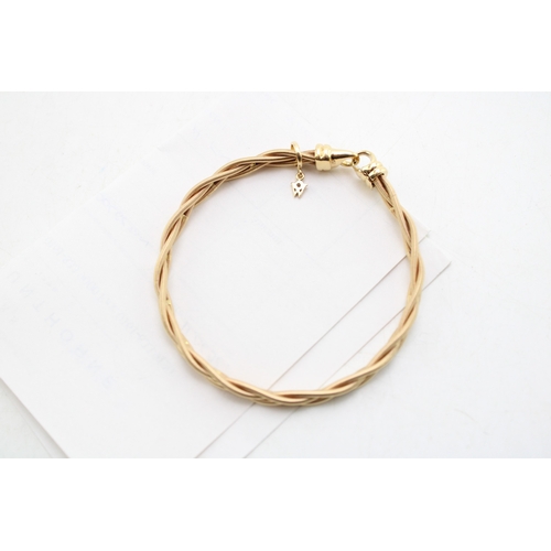 223 - A Wellendorff 18ct spun gold bracelet of four interwoven spun strands, of silken form, with diamond ... 