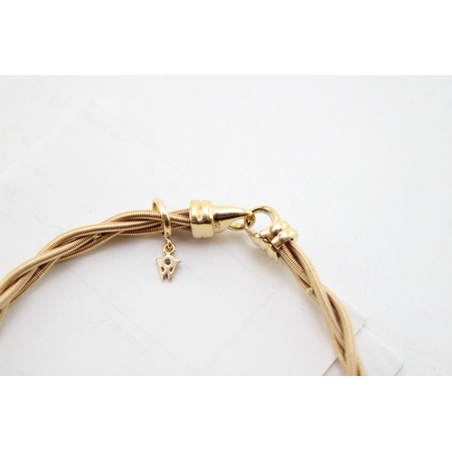 223 - A Wellendorff 18ct spun gold bracelet of four interwoven spun strands, of silken form, with diamond ... 