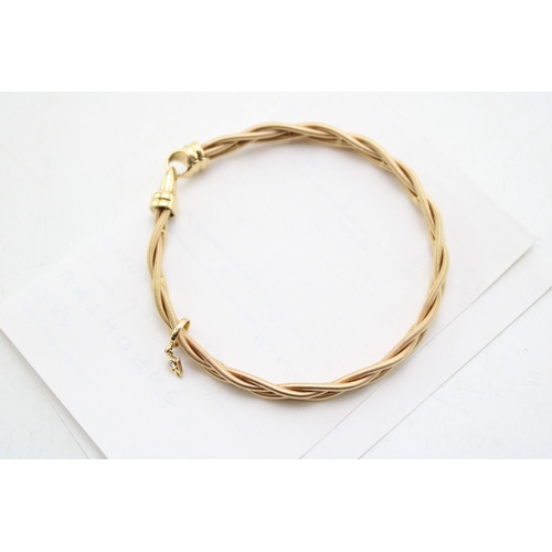 223 - A Wellendorff 18ct spun gold bracelet of four interwoven spun strands, of silken form, with diamond ... 