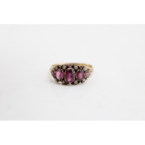 251 - A Victorian, 15ct gold, amethyst five stone ring the oval amethysts accentuated with seed pearls in ... 