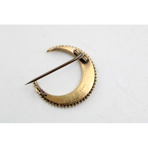 252 - A 15ct gold and seed pearl and pale coral crescent moon brooch, approximately 32mm diameter, with ba... 