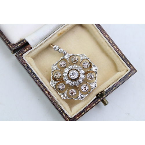 265 - An Art Nouveau diamond set metamorphic pendant brooch, with central diamond of approximately 4.5mm d... 