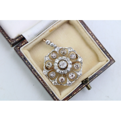 265 - An Art Nouveau diamond set metamorphic pendant brooch, with central diamond of approximately 4.5mm d... 