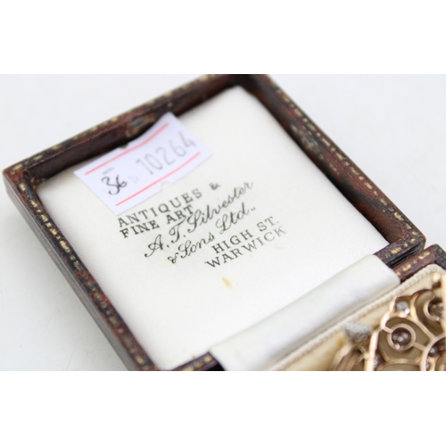 265 - An Art Nouveau diamond set metamorphic pendant brooch, with central diamond of approximately 4.5mm d... 