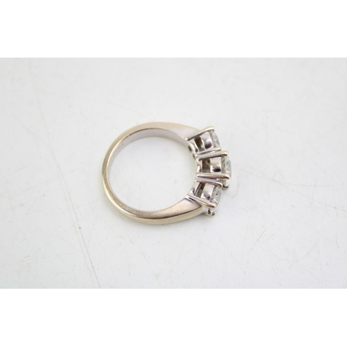 327 - An 18ct white gold and diamond three stone ring the central stone of approximately 1ct, 6.47mm diame... 