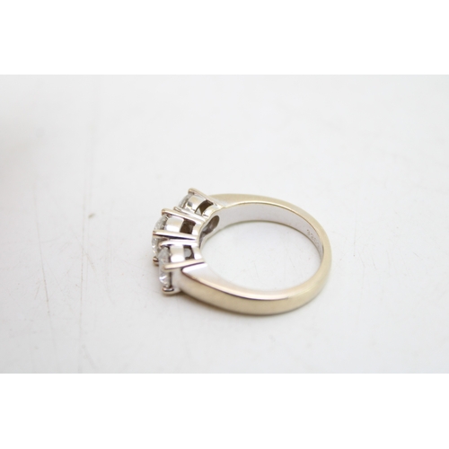 327 - An 18ct white gold and diamond three stone ring the central stone of approximately 1ct, 6.47mm diame... 