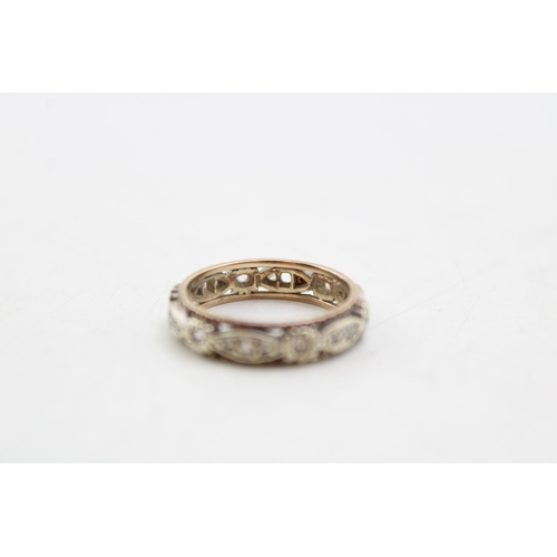 339 - A 9ct gold, silver and cubic zirconia ring, size P/Q, 3.9g.