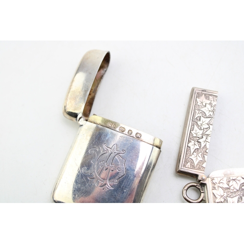 49 - A Victorian silver card case of rectangular form, the whole engraved throughout with ivy leaves, wit... 