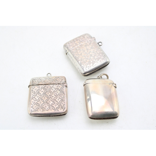 53 - A group of three late Victorian vesta cases, each with applied female portrait plaque including one ... 