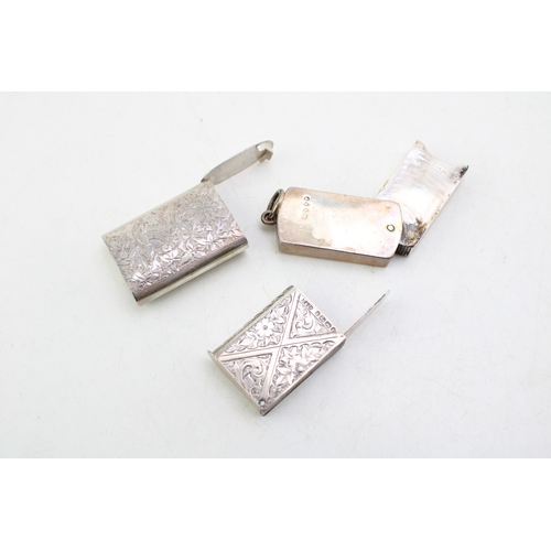 59 - A Victorian silver vesta case of curved rectangular form, the interior on swivel hinge to reveal mat... 