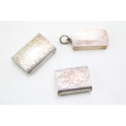 59 - A Victorian silver vesta case of curved rectangular form, the interior on swivel hinge to reveal mat... 