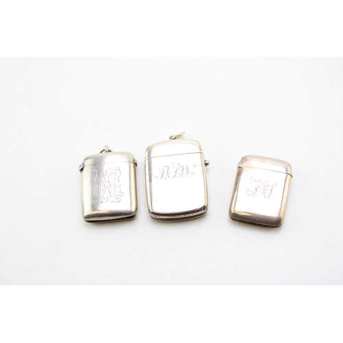 60 - A group of three late 19th century Victorian silver vesta cases,  of rectangular form, with polished... 