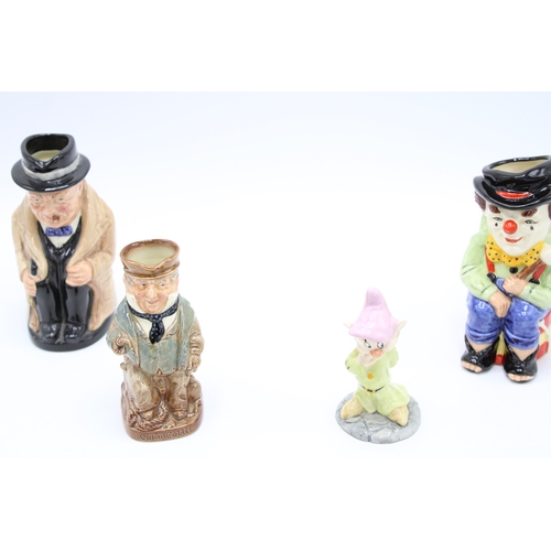 187 - Royal Doulton Toby jugs to include a large and medium Churchill, a Clown, Captain Cuttle and a figur... 
